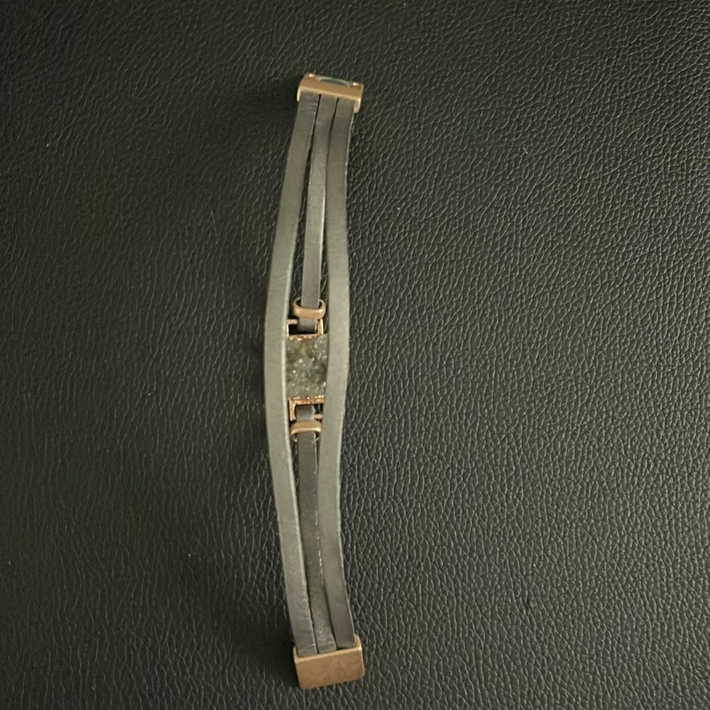 Grey leather bracelet with stone